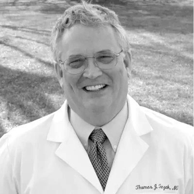 Thomas Tomzak, M.D.